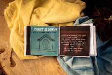 Load image into Gallery viewer, A Baby's Guide to Christmas cloth book - littlelightcollective