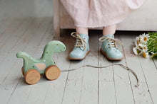 Load image into Gallery viewer, Wooden Pull Toy Dinosaur - littlelightcollective