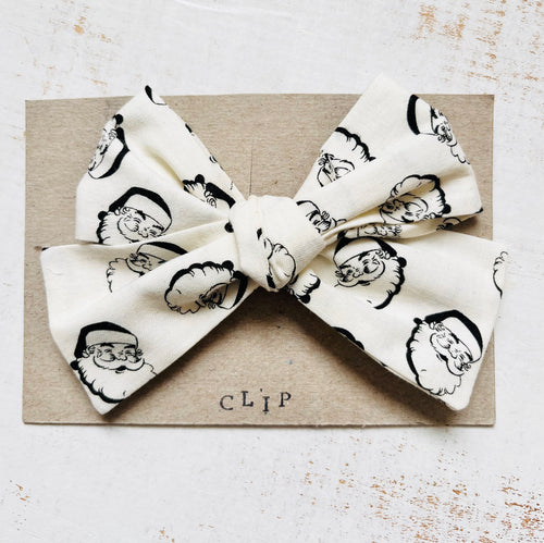 Handmade Bow Clip - Vintage Santa Fabric - littlelightcollective