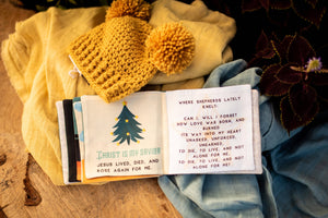A Baby's Guide to Christmas cloth book - littlelightcollective