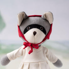 Load image into Gallery viewer, Gwendolyn Raccoon in Natural Tunic and Red Bonnet - littlelightcollective
